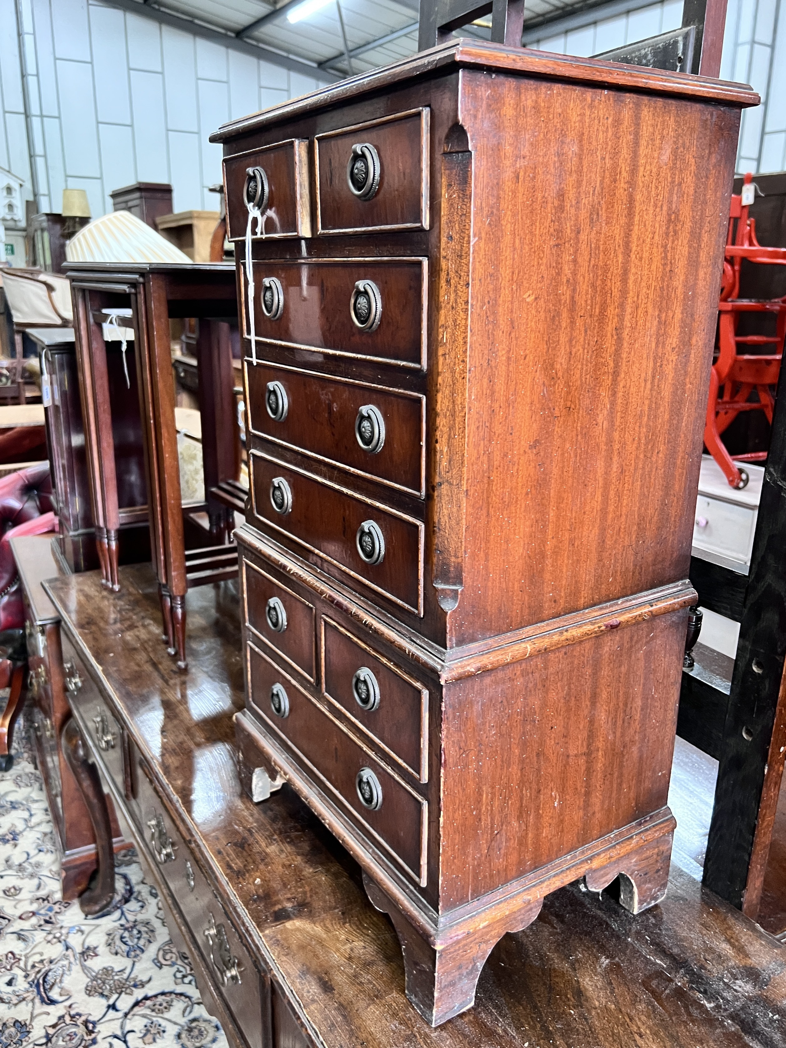 A small reproduction mahogany chest, width 41cm, depth 29cm, height 76cm